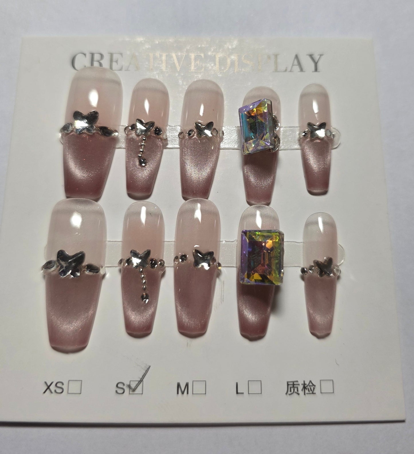 Ladies white with pink cateye tips witg butterfly design and big gem on ring finger press on nails small