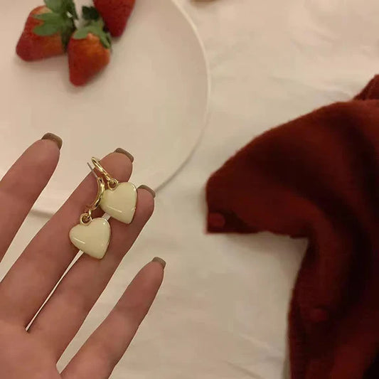 Ladies cream coloured love heart dangle earrings