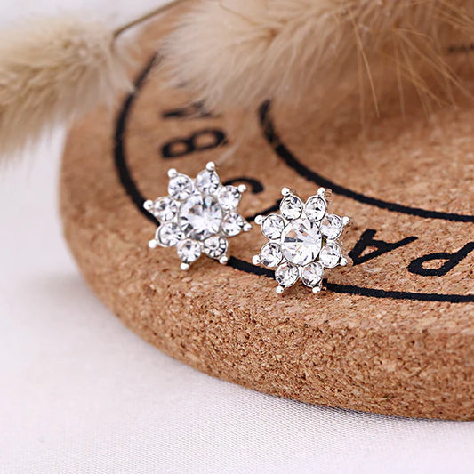 Ladies cute elegant diamond flower with a silver plating outline alloy.