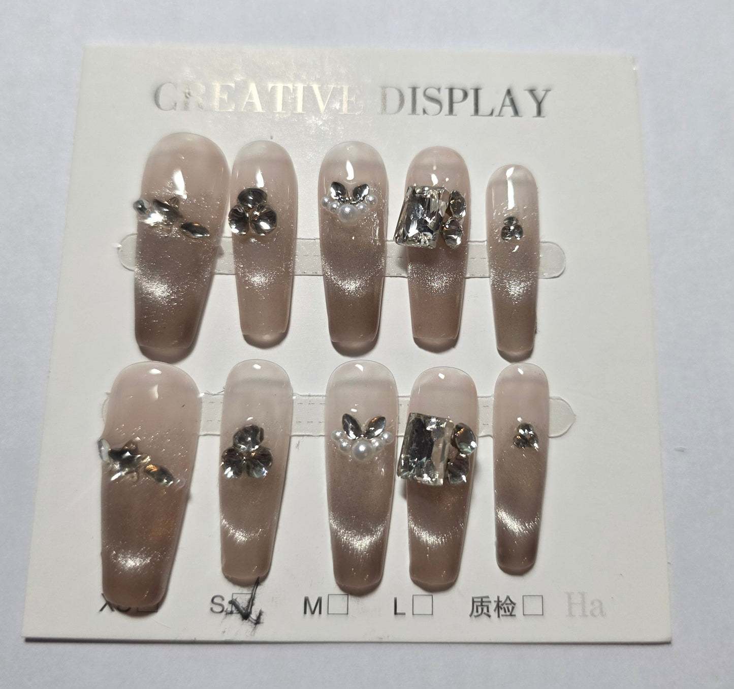 Ladies light mocha cateye with unique diamonte square design press on nails small long.