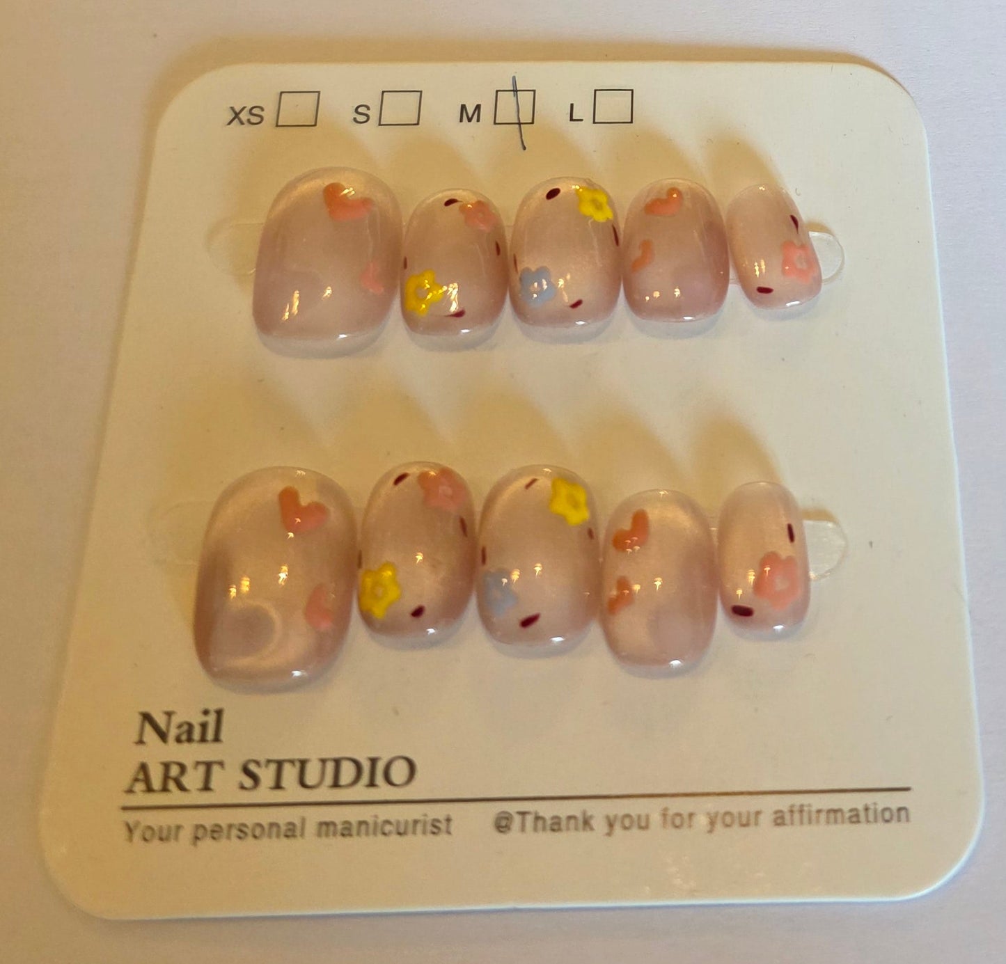 Ladies cateye pink with cute heart and daisy design rounded  press on nails medium short