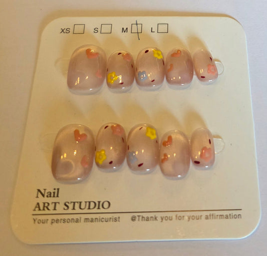 Ladies cateye pink with cute heart and daisy design rounded  press on nails medium short