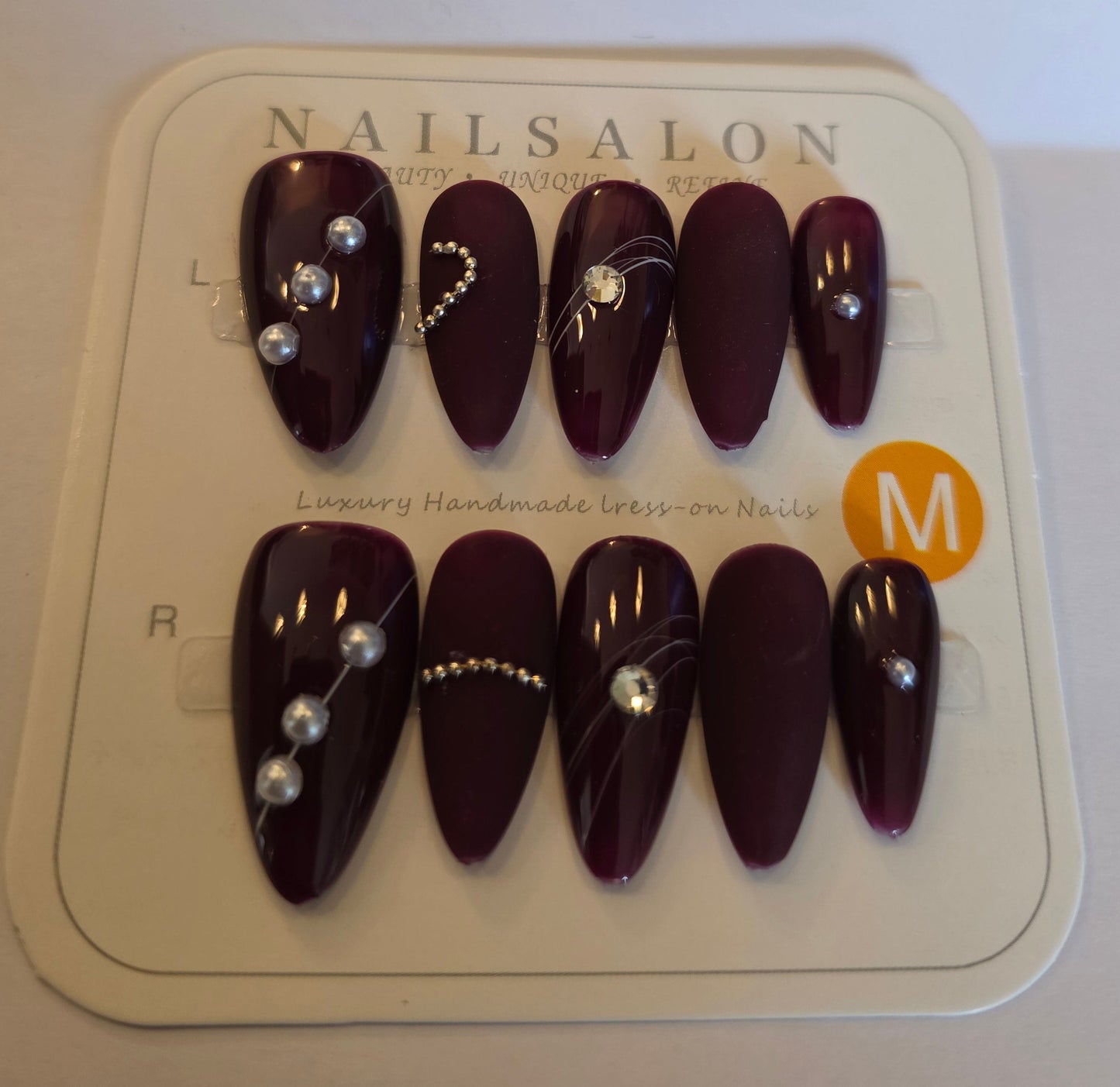 Ladies dark red with elegant detailed design almond press on nails medium