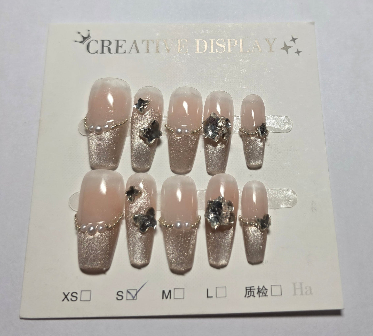 Ladies pink with light gold cateye tips with unique gem design press on nails small