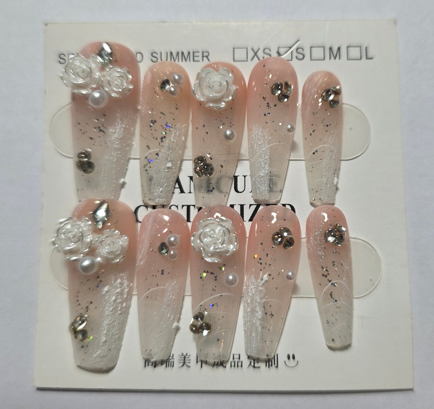 Ladies pink and white with white rosespress on nails small